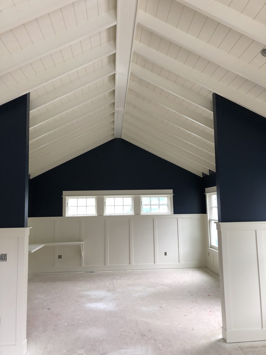 Cathedral ceiling and wall panel trim detail