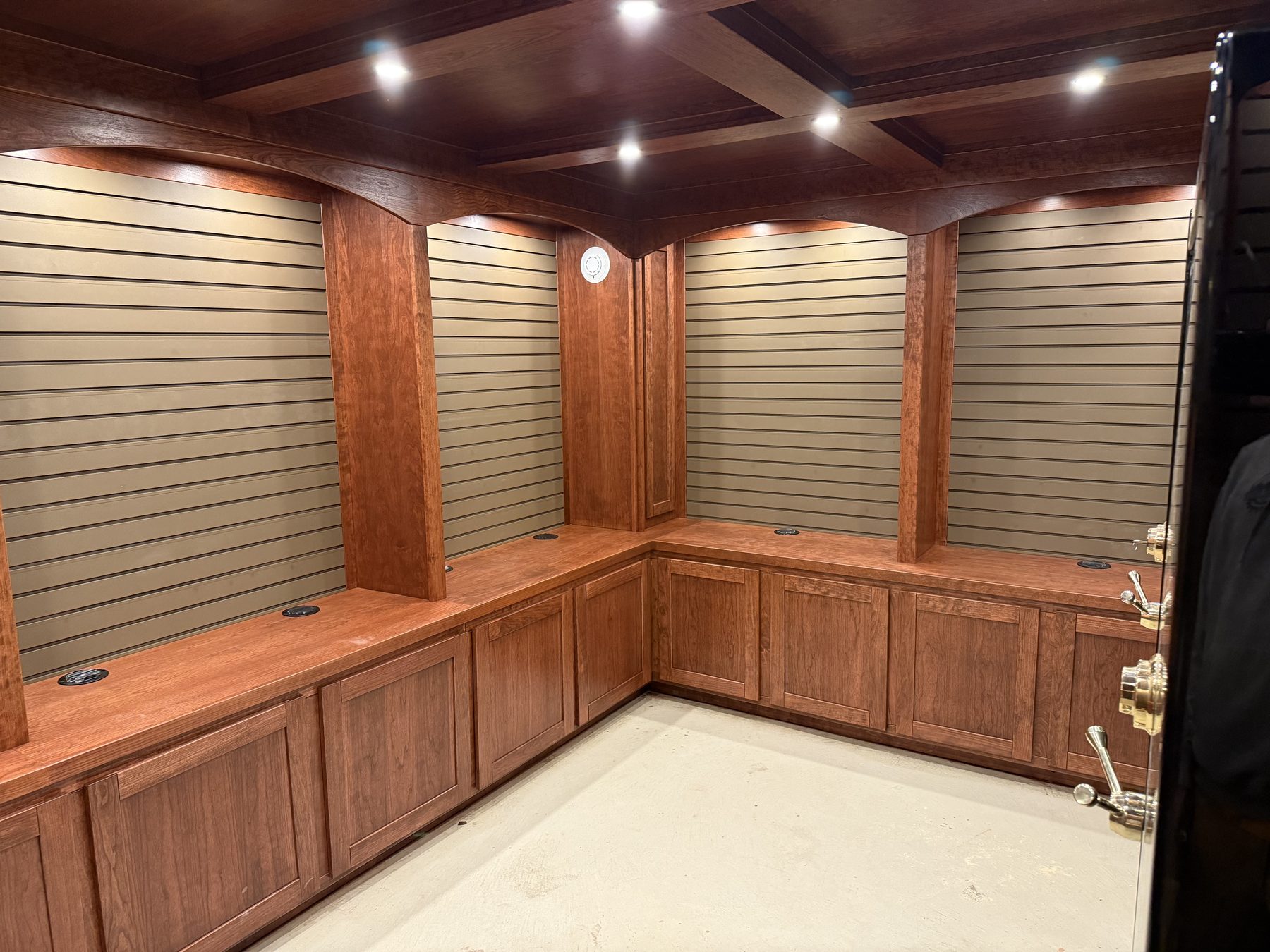 Stained wood built-in cabinetry and storage