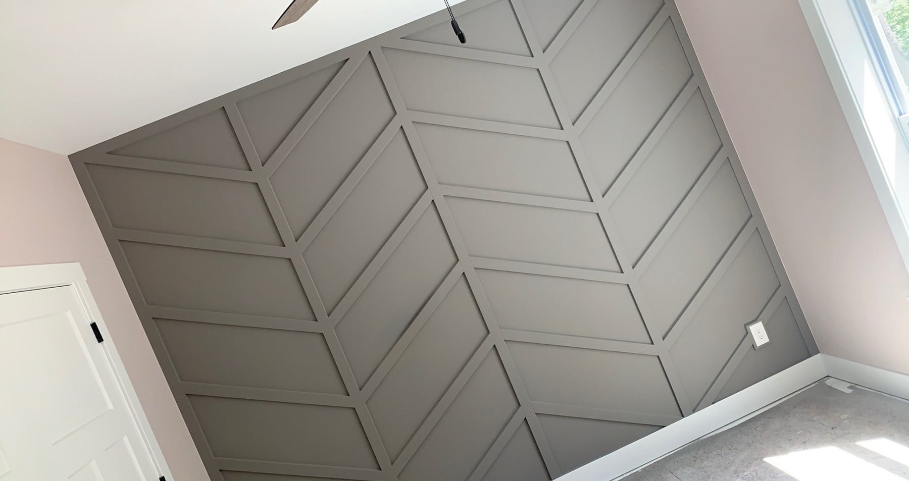 Chevron-style accent wall paneling detail