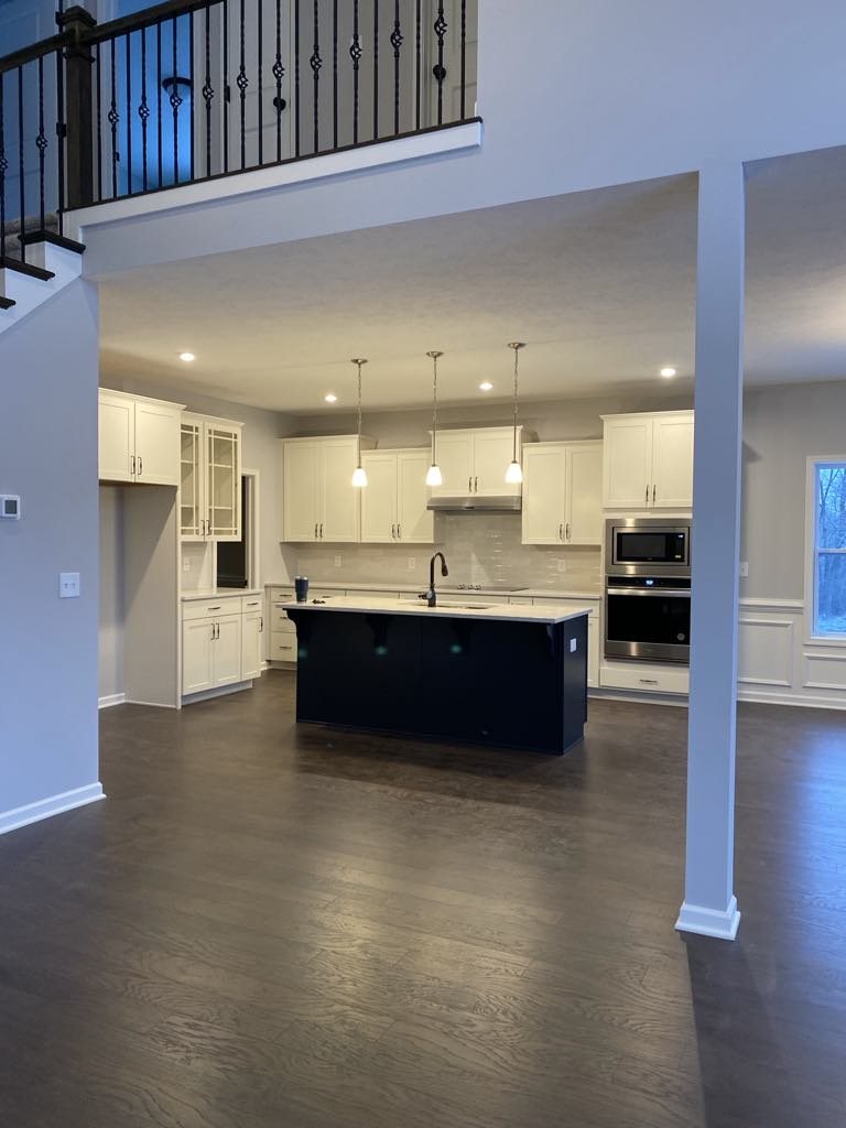 Custom kitchen cabinetry and island finish work
