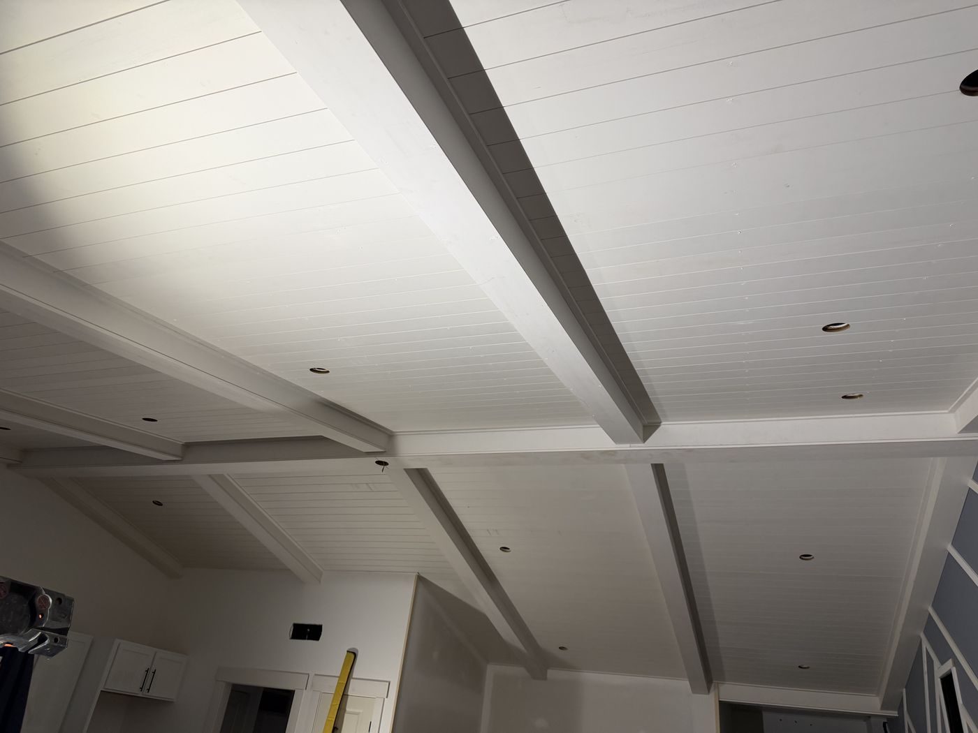 Ceiling beam grid primed white before painting