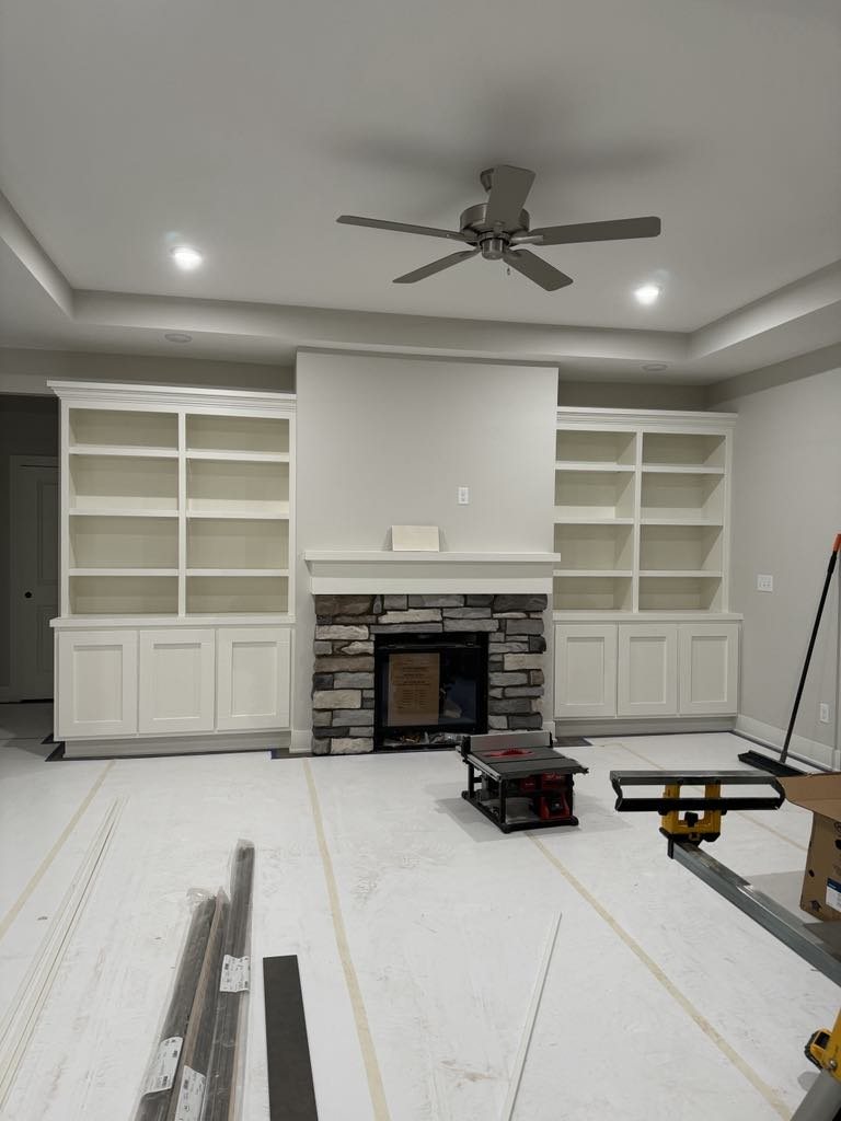 Custom fireplace built-ins and mantel by Pro Line