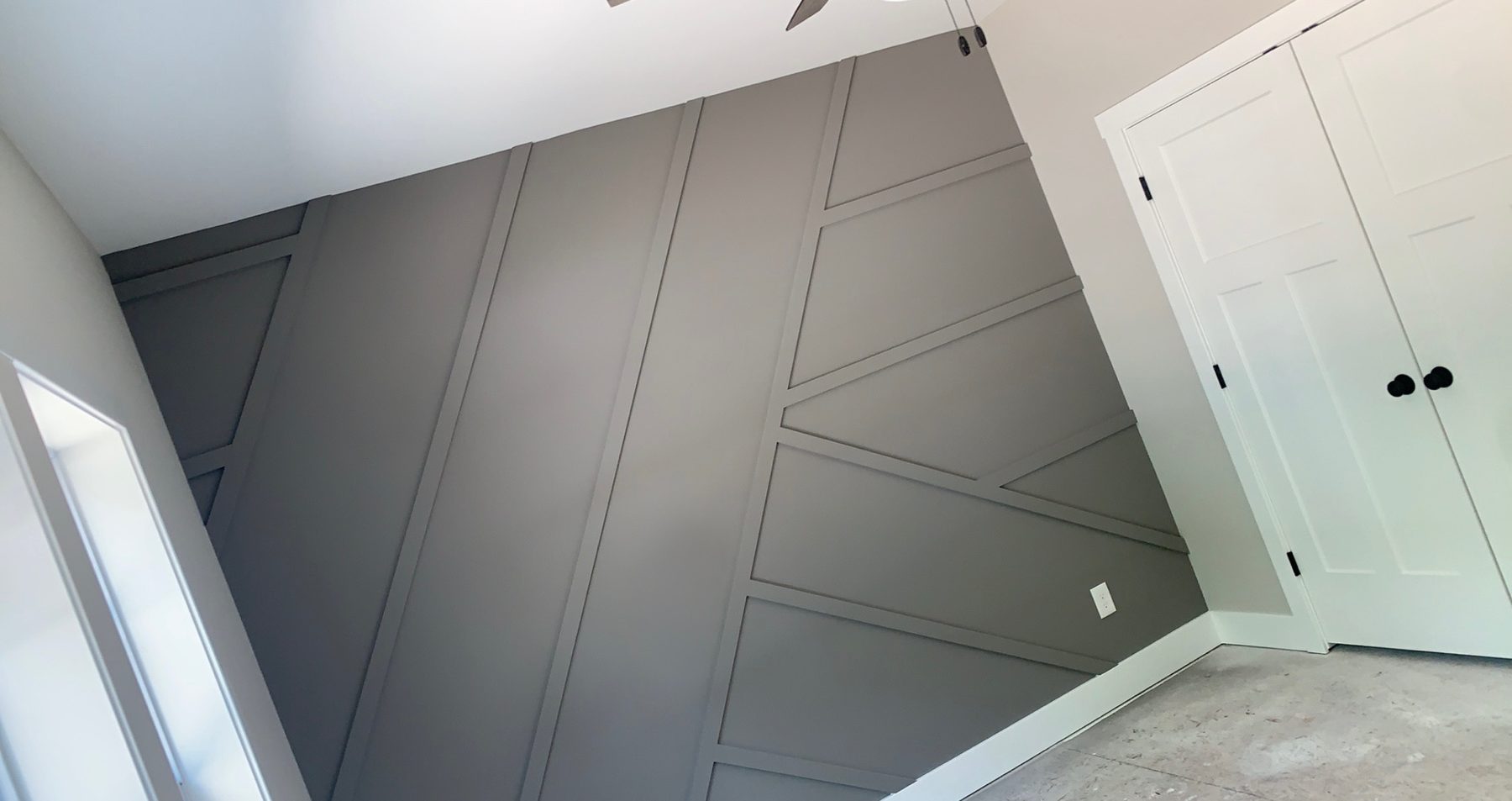Geometric raised panel accent wall detail