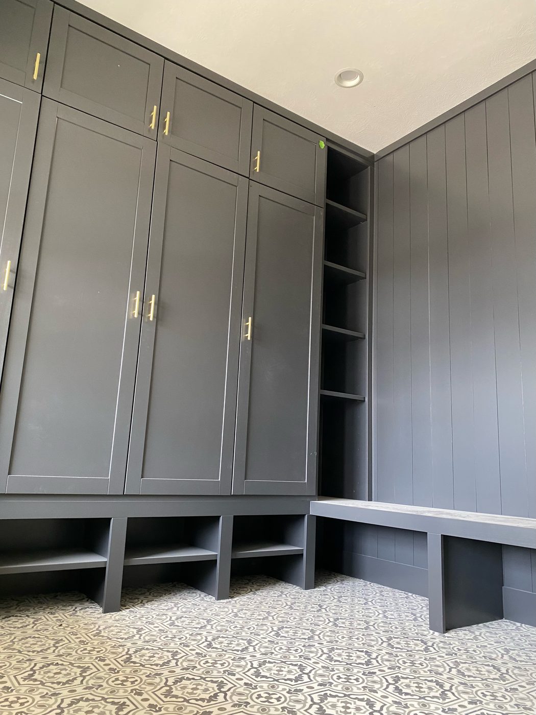 Charcoal mudroom built-in storage and bench cabinetry